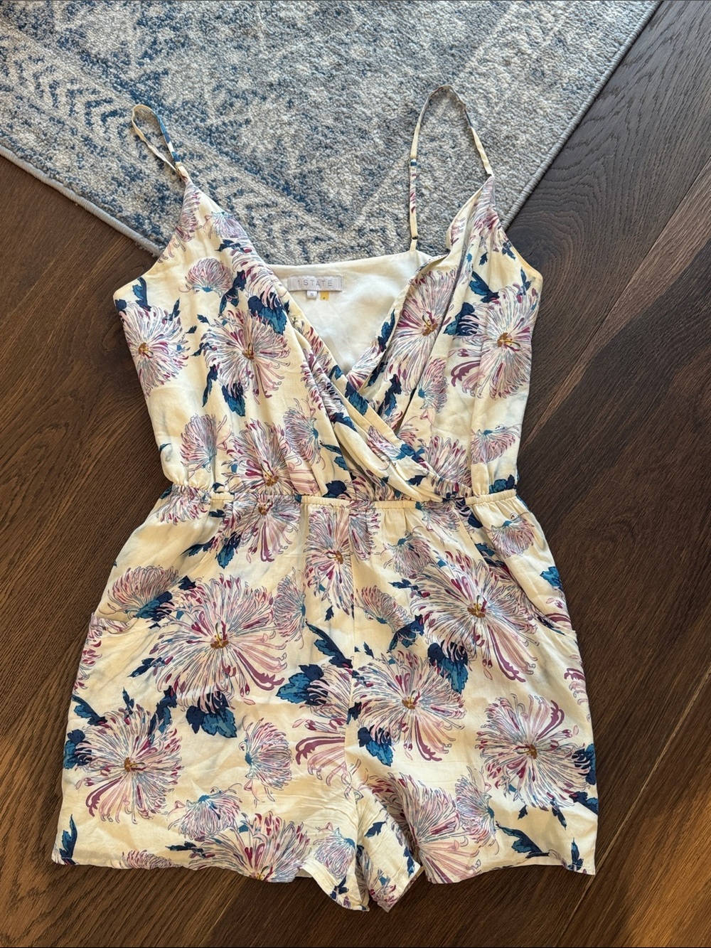 1. State Cream Floral Wrap Romper with Pink & Blue Blooms